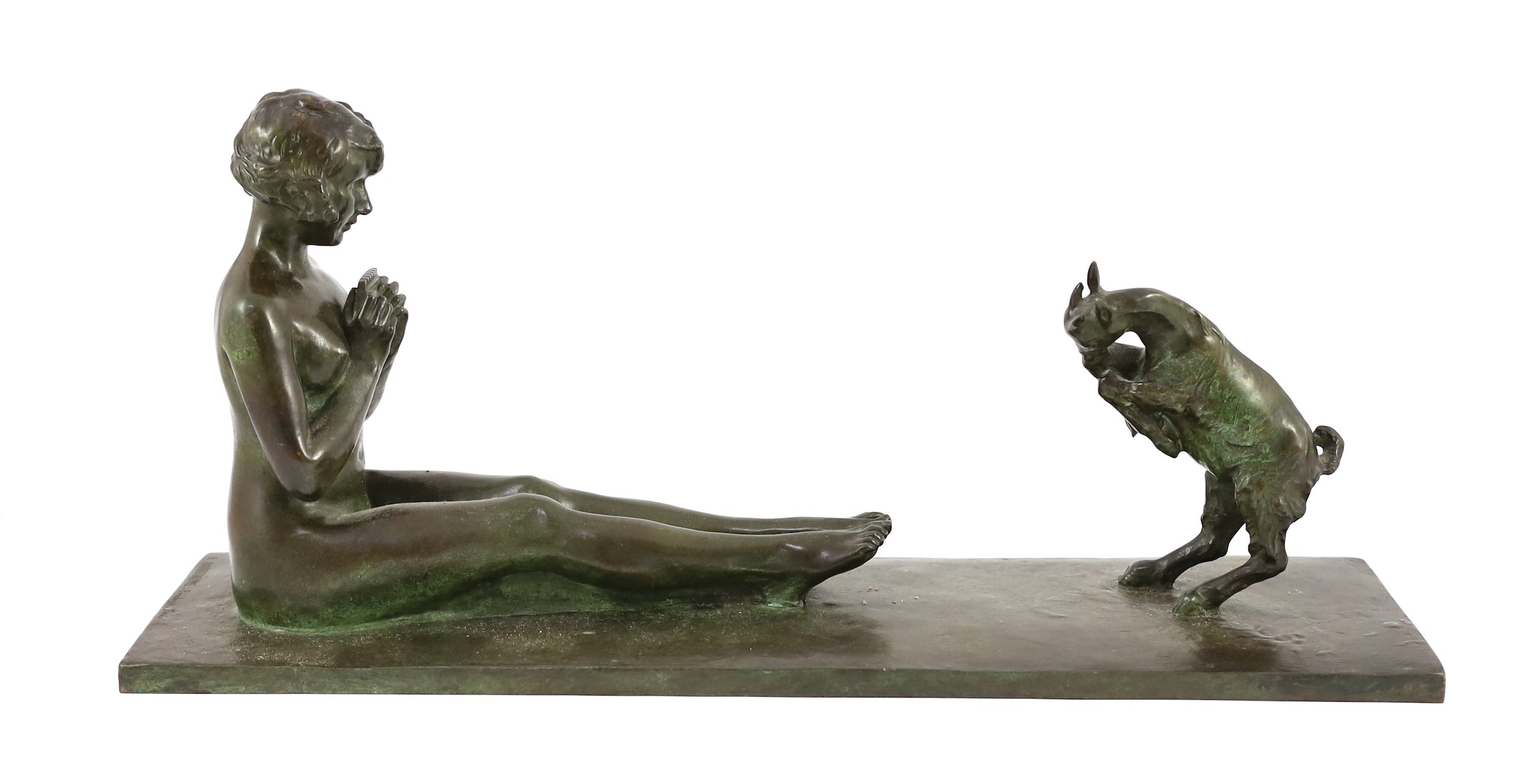 After Paul Silvestre (French, 1884-1976). A patinated Art Deco bronze group of a Bacchante and faun, 27cm high 60cm long